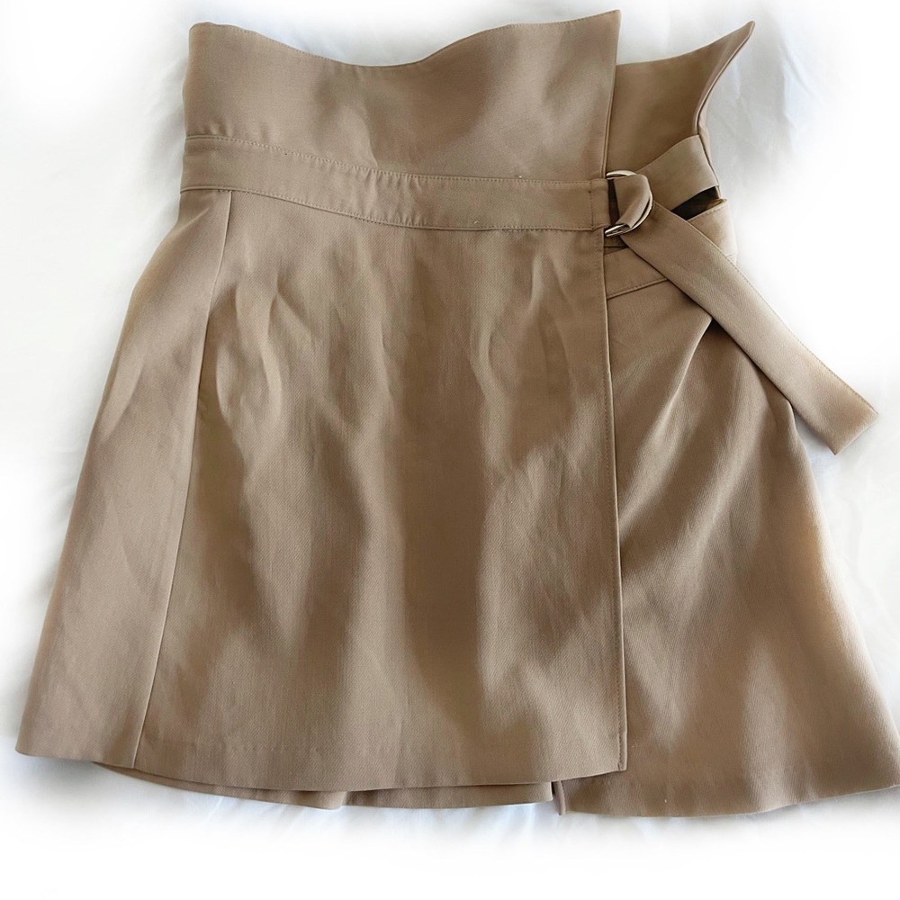 Tan mini wrap skirt with gold buckle detailing